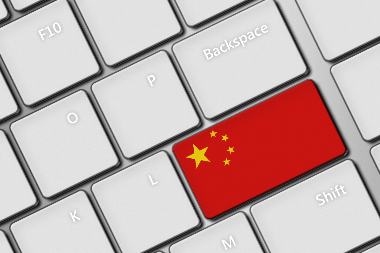 closeup of computer keyboard with chinese flag button