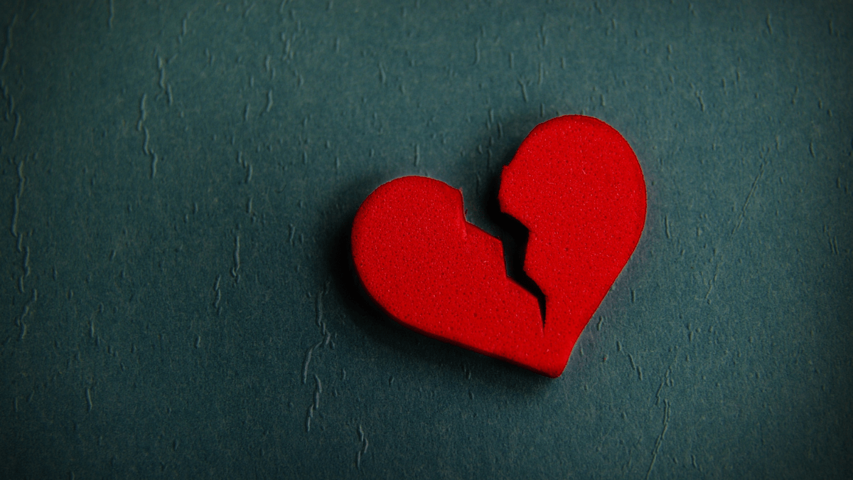 A heart shape with a large crack in it.